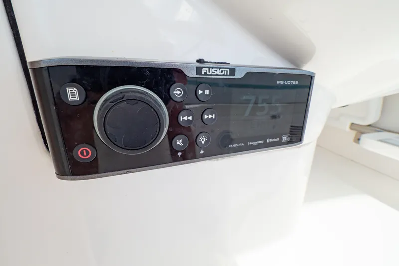 Slide: The Image of Fusion MS-UD755 stereo system on 2018 Intrepid 475 Sport Yacht dashboard. - 117