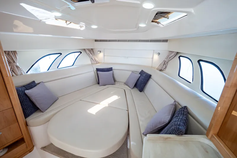 Slide: The Image of Luxurious interior of 2018 Intrepid 475 Sport Yacht with plush seating and elegant design. - 136