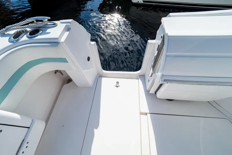 Slide: The Image of 2018 Intrepid 475 Sport Yacht deck with water view and sleek design. - 43
