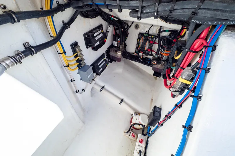 Slide: The Image of Electrical wiring and components inside a 2018 Intrepid 475 Sport Yacht. - 57