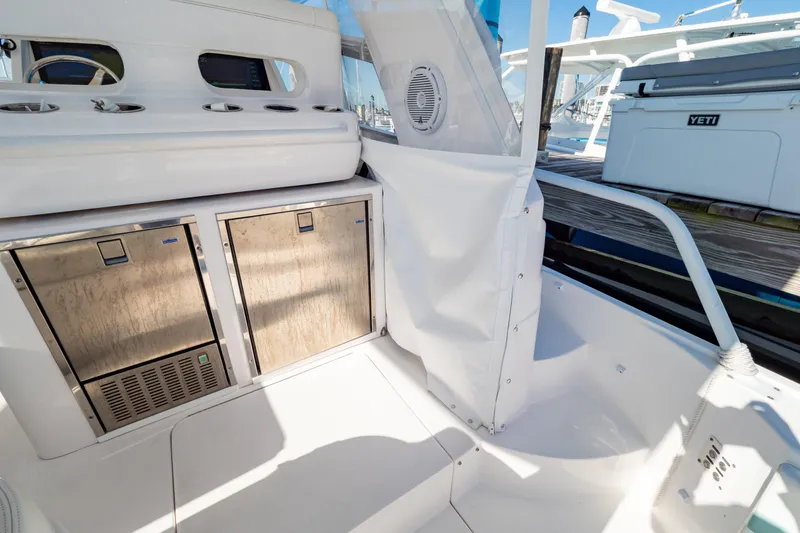 Slide: The Image of 2018 Intrepid 475 Sport Yacht interior with stainless steel appliances and sleek design. - 72