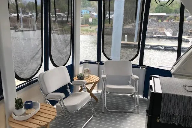 Slide: The Image of Interior of 1993 Carver 370 Aft Cabin Motor Yacht with seating and decor. - 14