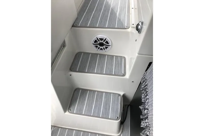 Slide: The Image of Steps on a 1993 Carver 370 Aft Cabin Motor Yacht with speaker detail. - 19