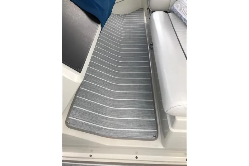 Slide: The Image of Interior view of 1993 Carver 370 Aft Cabin Motor Yacht with striped flooring. - 20