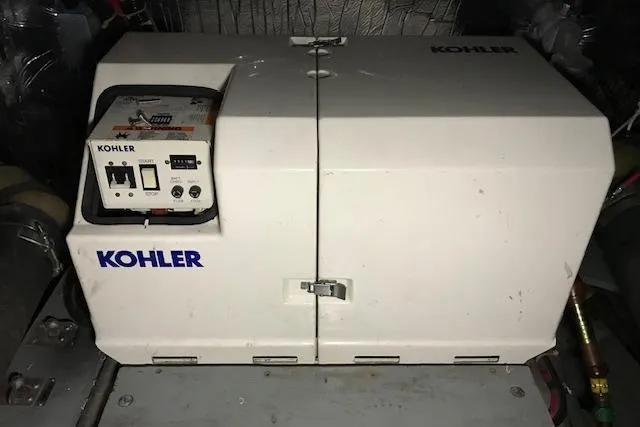 Slide: The Image of Kohler generator in a 1993 Carver 370 Aft Cabin Motor Yacht engine room. - 34