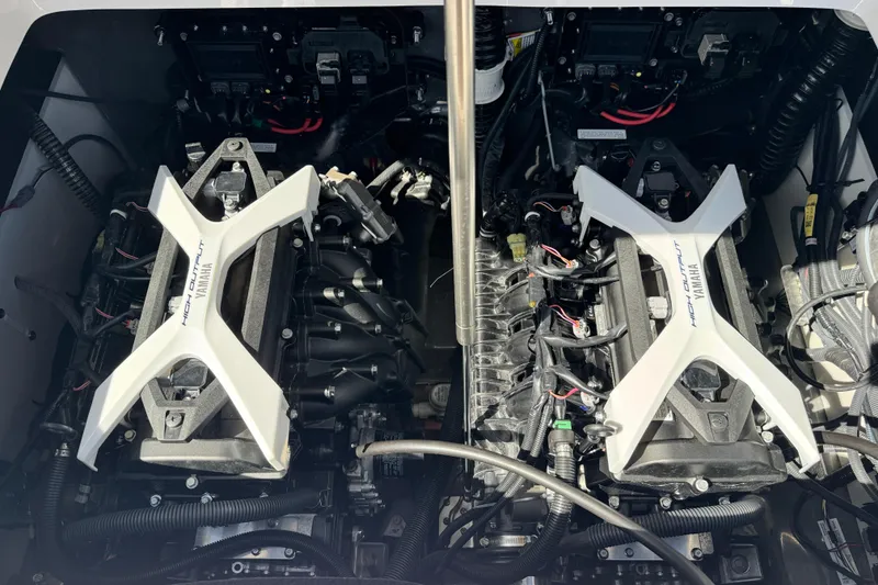 Slide: The Image of 2025 Yamaha Boats 222 FSH Sport engine compartment showcasing dual high-output engines. - 19