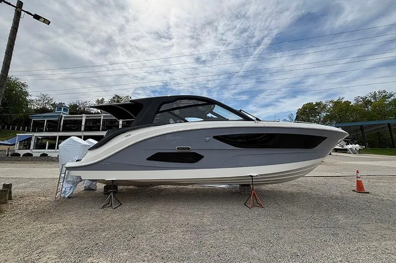 The Image of 2026 Sea Ray Sundancer 370 Outboard boat on display, side view, outdoors. - 0