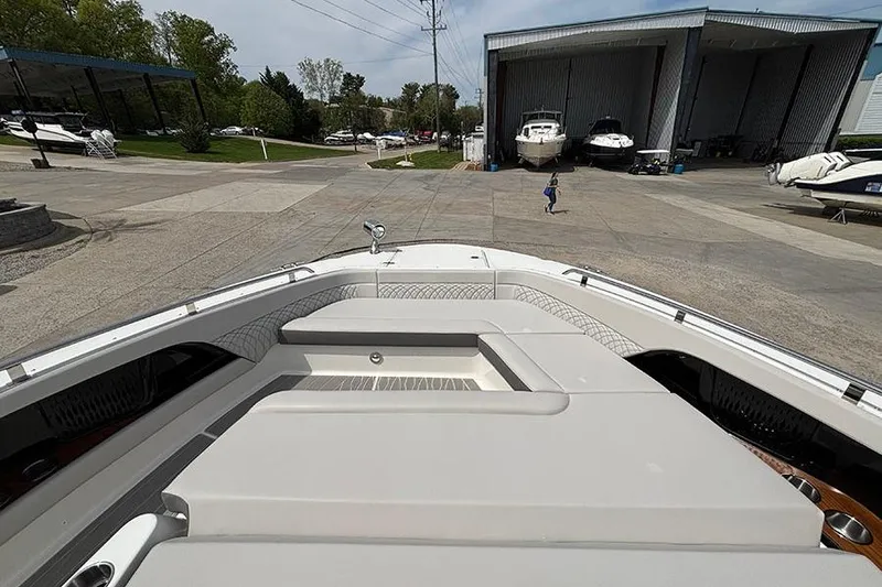 Slide: The Image of 2026 Sea Ray Sundancer 370 Outboard at marina, view from bow deck. - 41