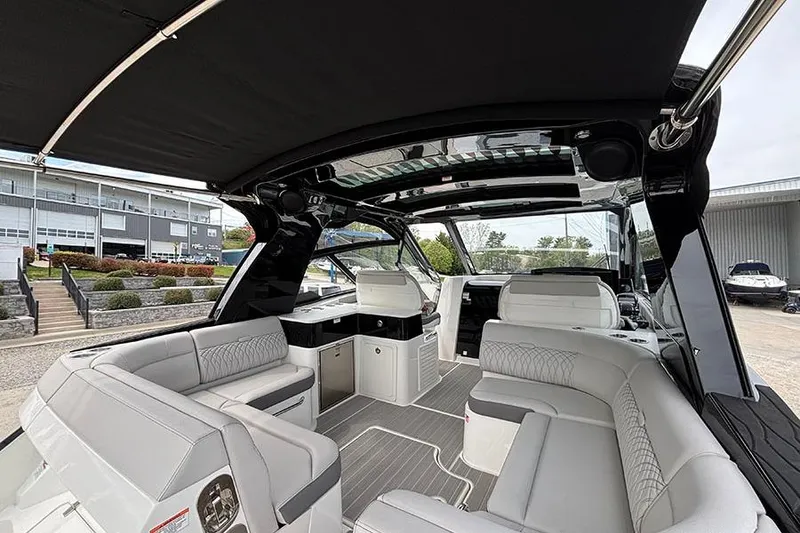 Slide: The Image of Luxurious interior of 2026 Sea Ray Sundancer 370 Outboard with sleek seating and modern design. - 8
