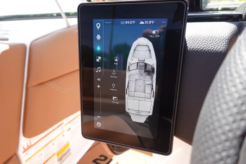 Slide: The Image of Touchscreen control panel in 2026 Malibu Wakesetter 21 LX boat interior. - 11