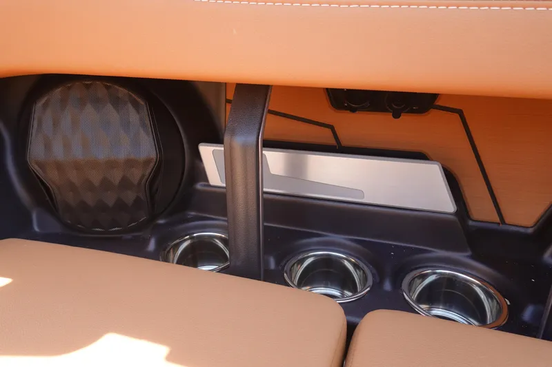 Slide: The Image of Interior of 2026 Malibu Wakesetter 21 LX with cup holders and speaker. - 20