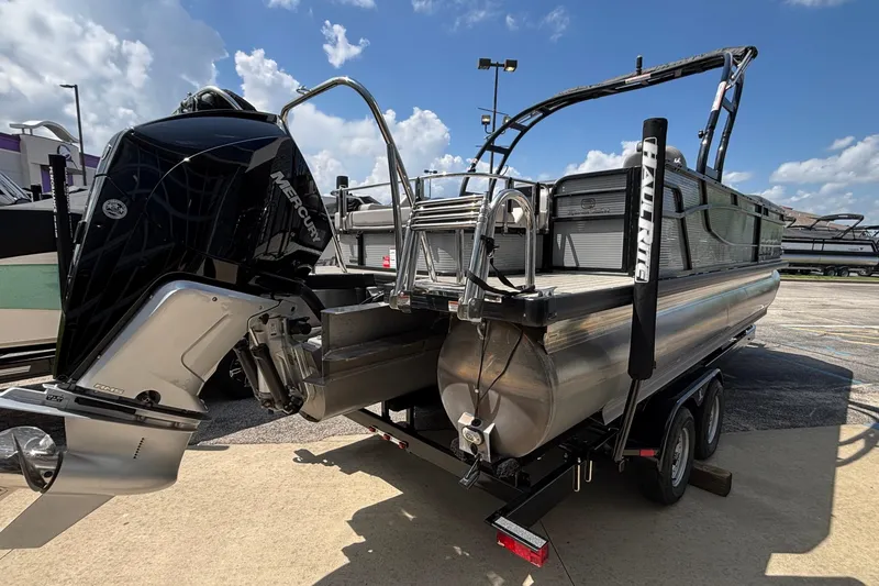Slide: The Image of 2023 Princecraft Quorum 25 RL pontoon boat with Mercury engine on trailer. - 10