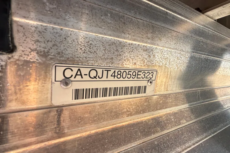 Slide: The Image of 2023 Princecraft Quorum 25 RL boat hull identification number plate. - 11