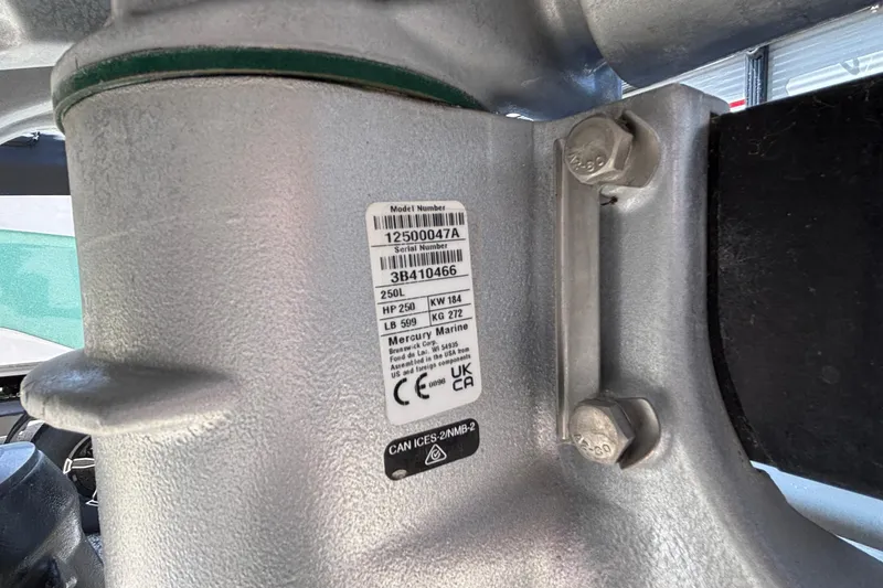 Slide: The Image of Label on a 2023 Princecraft Quorum 25 RL boat engine, showing specifications and serial number. - 12