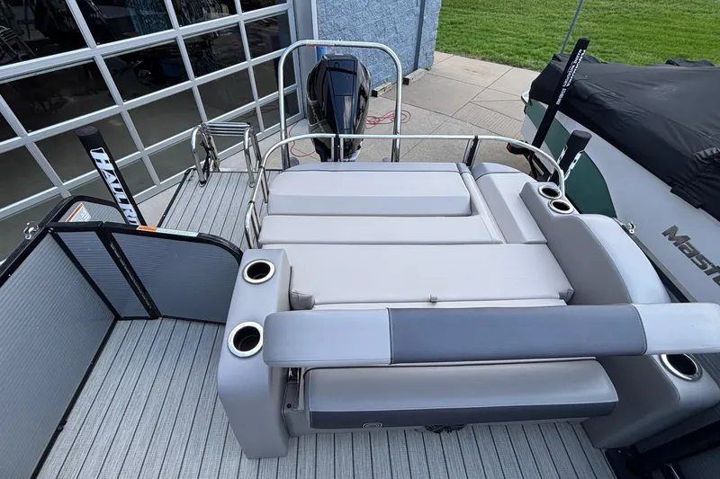Slide: The Image of 2023 Princecraft Quorum 25 RL boat with spacious seating and modern design. - 18