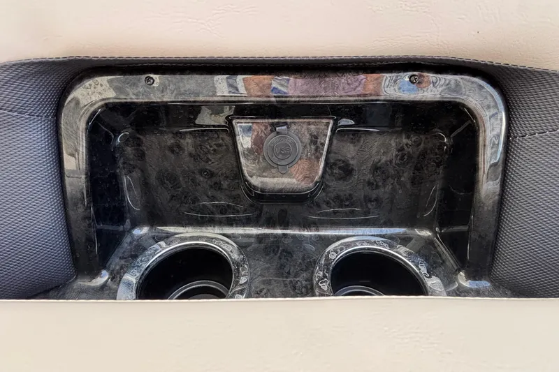 Slide: The Image of Cup holders and storage compartment in 2023 Princecraft Quorum 25 RL boat. - 39