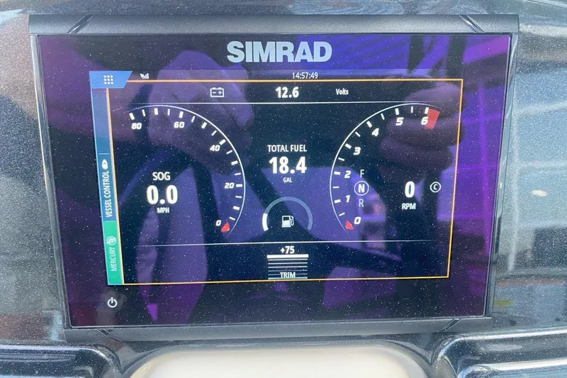 Slide: The Image of Simrad display on 2023 Princecraft Quorum 25 RL showing speed, fuel, and RPM metrics. - 45