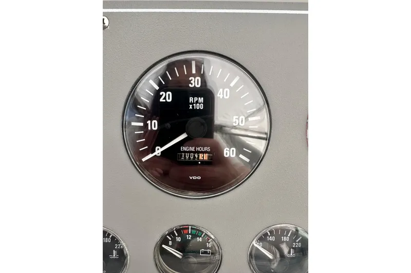 Slide: The Image of RPM gauge of 1997 Formula 34 Performance Cruiser showing engine hours. - 13