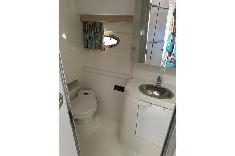 Slide: The Image of Bathroom interior of 1997 Formula 34 Performance Cruiser with sink and toilet. - 26