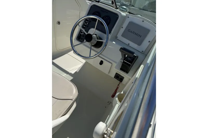 Slide: The Image of 2004 Hydra-Sports Lightning 202 DC boat cockpit with Garmin navigation system. - 7