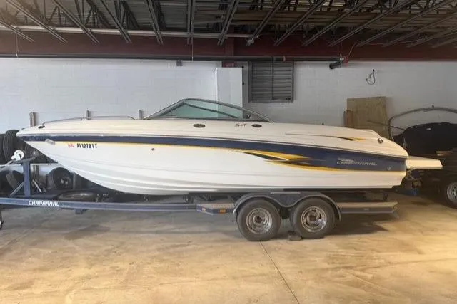 Slide: The Image of 2002 Chaparral 216 SSi boat on trailer in indoor storage facility. - 2