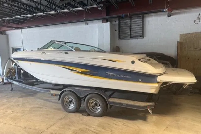 Slide: The Image of 2002 Chaparral 216 SSi boat on trailer in indoor storage facility. - 4