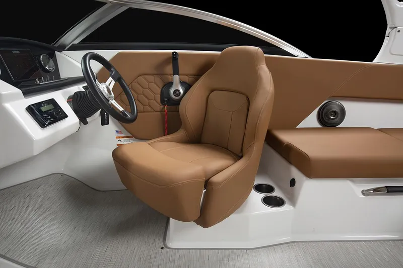 Slide: The Image of Manufacturer Provided Image: 2025 Four Winns H1 OB boat interior with brown seating and modern dashboard. - 10