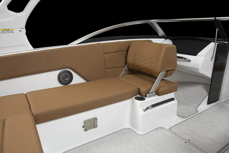 Slide: The Image of Manufacturer Provided Image: 2025 Four Winns H1 OB boat interior with brown seating and modern design. - 13