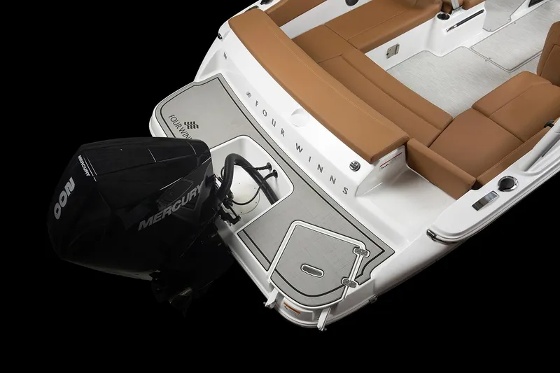 Slide: The Image of Manufacturer Provided Image: 2025 Four Winns H1 OB boat with Mercury engine, featuring sleek design and tan seating. - 15