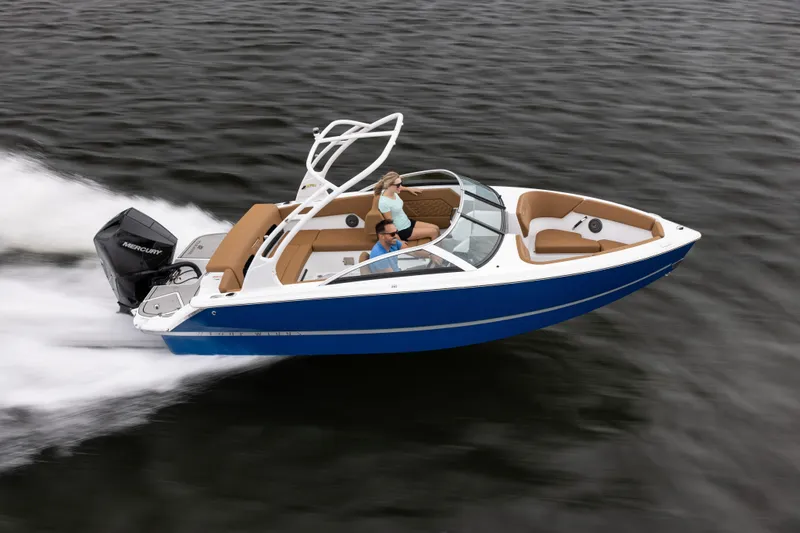 Slide: The Image of 2026 Four Winns H1 OB speedboat cruising on water, featuring sleek design and powerful outboard engine. - 2