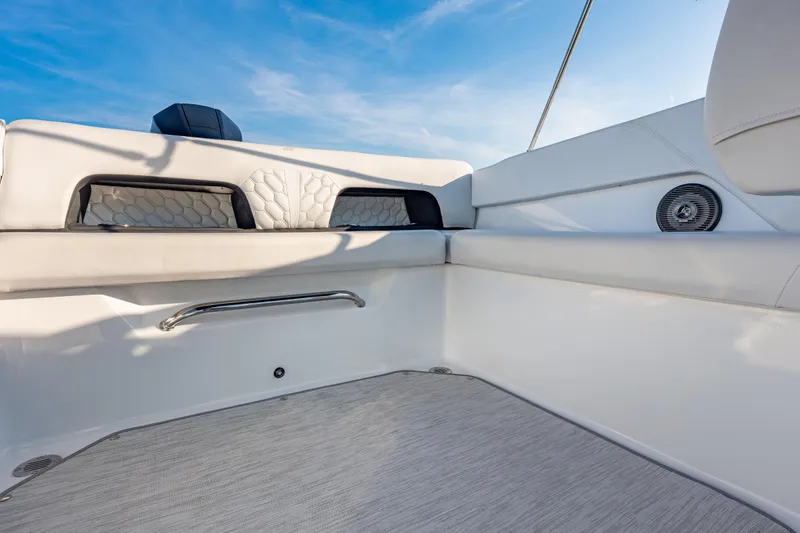 Slide: The Image of 2026 Four Winns H1 OB boat interior with sleek seating and modern design. - 24