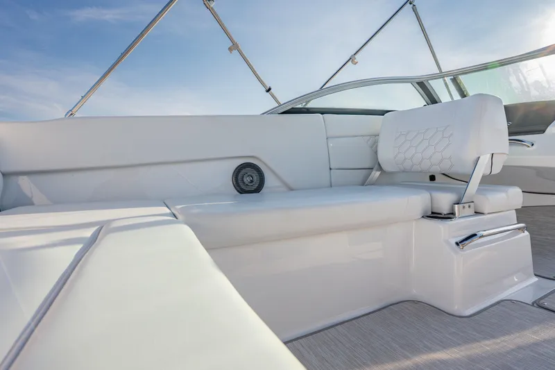 Slide: The Image of 2026 Four Winns H1 OB boat interior with white seating and modern design. - 26