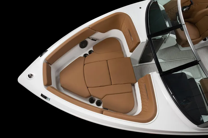 Slide: The Image of Manufacturer Provided Image: 2025 Four Winns H1 OB boat interior with tan seating and sleek design. - 8