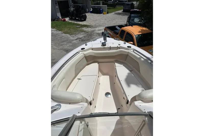 Slide: The Image of 2014 Grady-White Freedom 275 boat interior with spacious seating and clean design. - 8