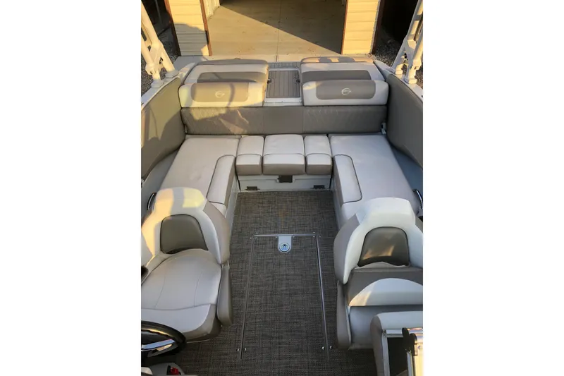 Slide: The Image of Interior of 2020 Crownline 235 SS boat with spacious seating and elegant design. - 32
