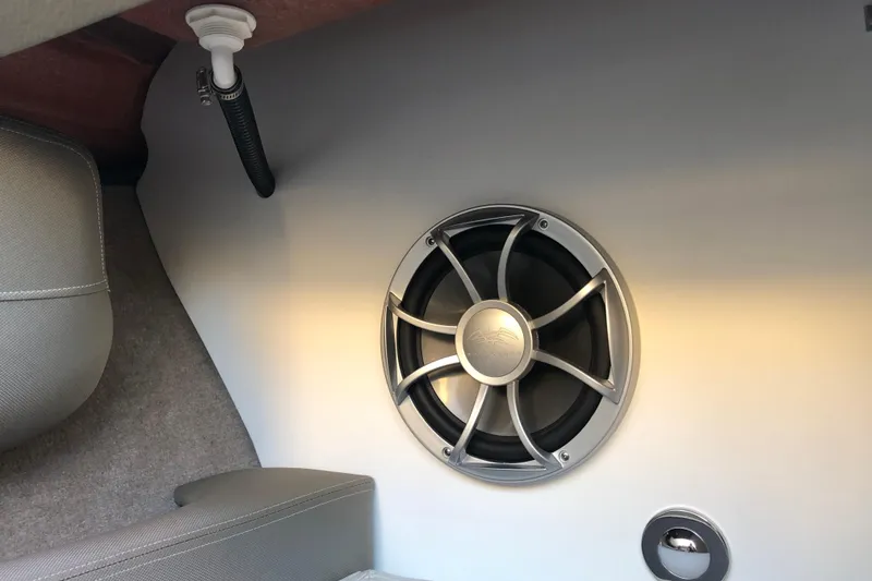 Slide: The Image of 2020 Crownline 235 SS boat interior with speaker and upholstery detail. - 47