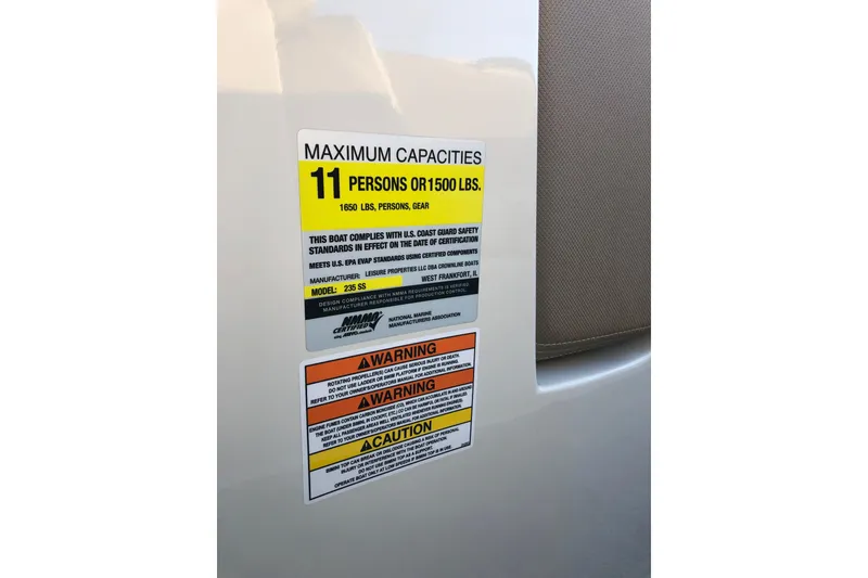 Slide: The Image of Capacity label on 2020 Crownline 235 SS boat, maximum 11 persons or 1500 lbs. - 48