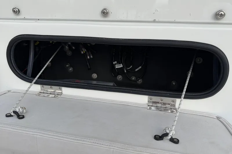 Slide: The Image of Open storage compartment on a 2026 Shallow Sport 22 Sport boat. - 14