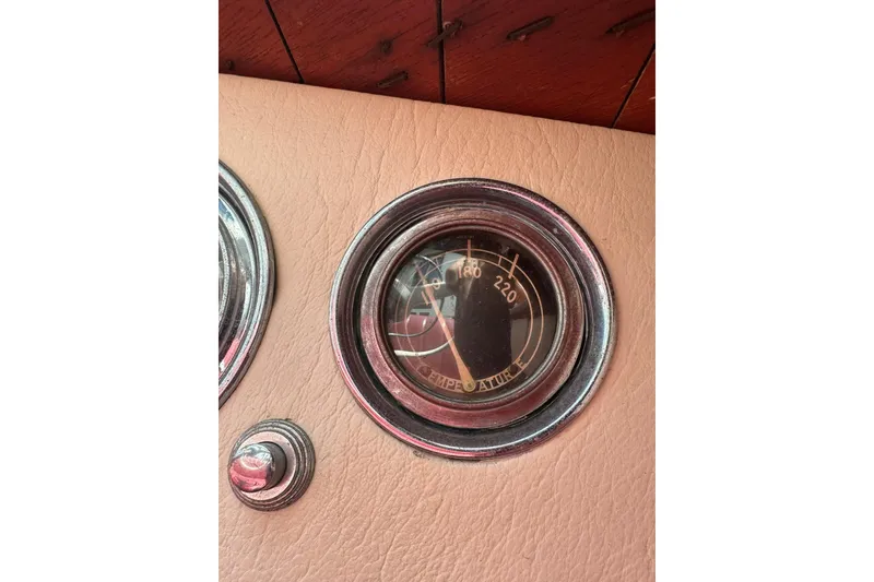 Slide: The Image of 1952 Chris-Craft 18 Runabout dashboard temperature gauge close-up. - 20