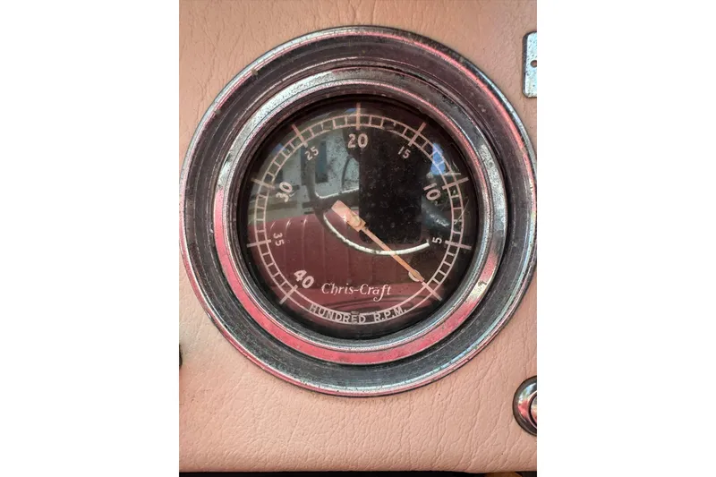 Slide: The Image of 1952 Chris-Craft 18 Runabout tachometer, vintage boat dashboard detail. - 22