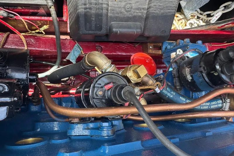 Slide: The Image of Close-up of a 1952 Chris-Craft 18 Runabout engine components and wiring. - 32