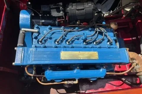 Slide: The Image of 1952 Chris-Craft 18 Runabout engine, blue, detailed view. - 33