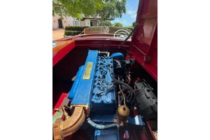 Slide: The Image of 1952 Chris-Craft 18 Runabout engine, blue and red, open hood view. - 34