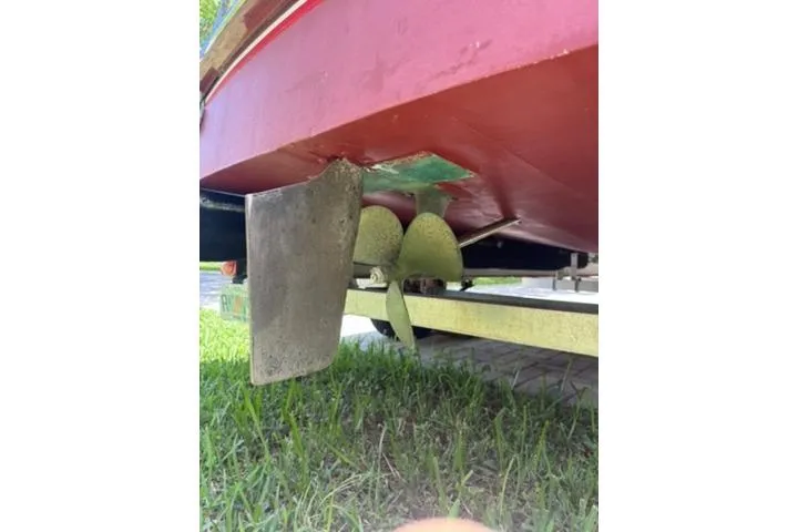 Slide: The Image of 1952 Chris-Craft 18 Runabout boat underside showing propeller and rudder. - 6