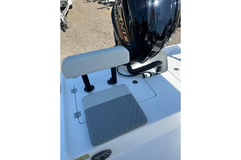 Slide: The Image of 2026 Action Craft 22 Bay boat seat and motor detail, featuring sleek design and modern upholstery. - 14