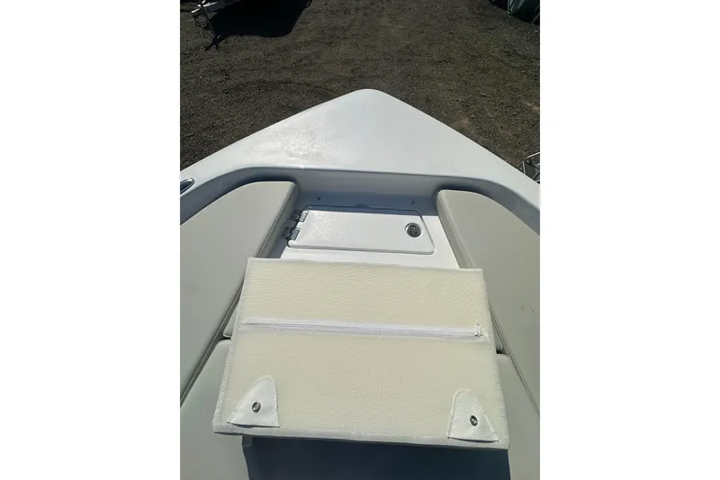 Slide: The Image of 2026 Action Craft 22 Bay boat deck with storage compartment and cushioned seating. - 35