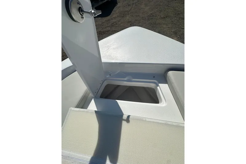 Slide: The Image of 2026 Action Craft 22 Bay boat interior with open storage compartment. - 36