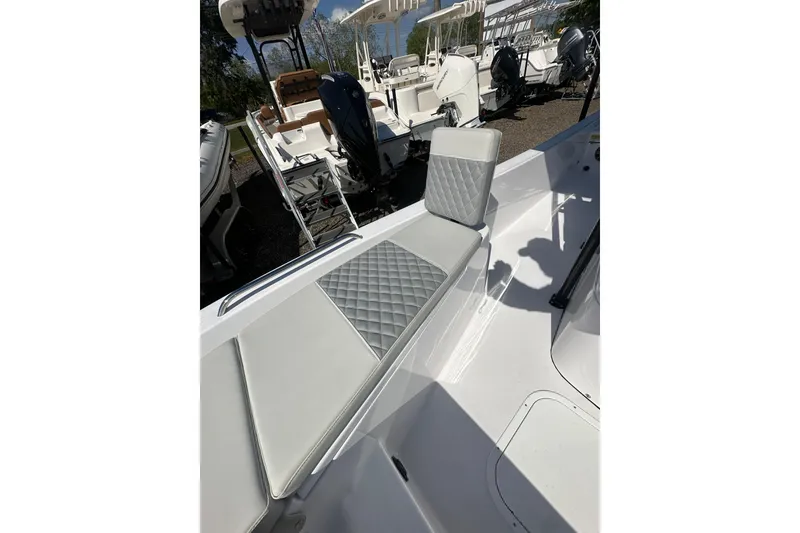 Slide: The Image of 2026 Action Craft 22 Bay boat with cushioned seating and sleek design. - 42
