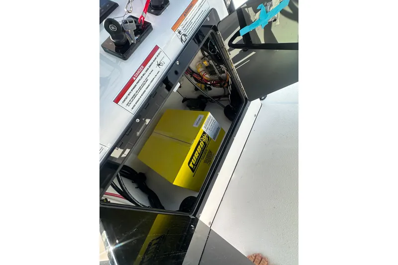 Slide: The Image of Interior view of 2026 Action Craft 22 Bay boat's control panel and wiring. - 45