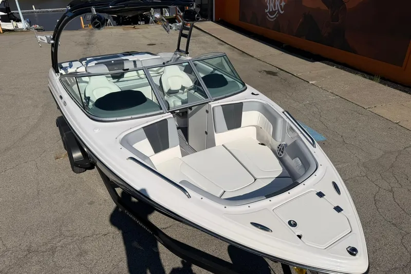 Slide: The Image of 2023 Chaparral 23 SSi boat with sleek design and spacious seating. - 3